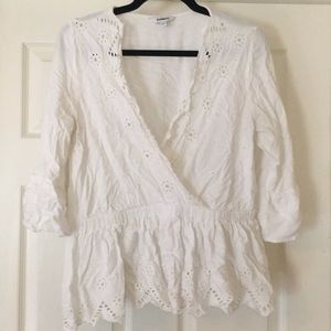 Adorable cream/white colored wrap top